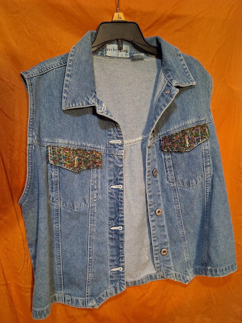 anchor blue light wash denim top with label detail